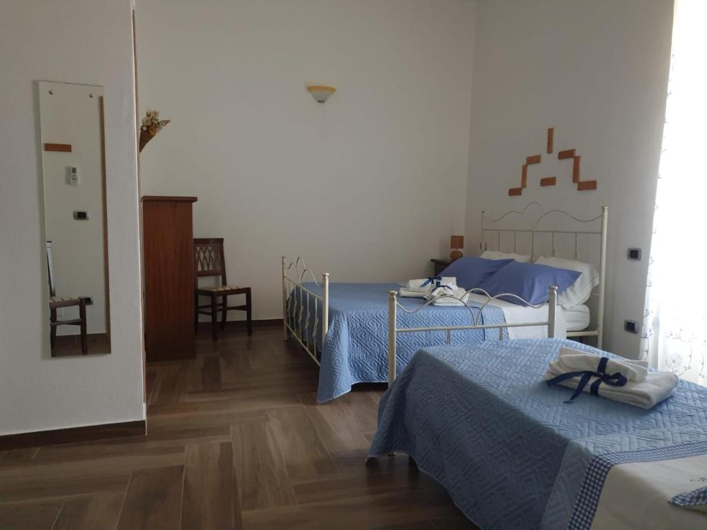 Postel nebo postele na pokoji v ubytování IL PRINCIPE