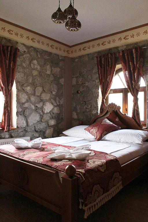 Postel nebo postele na pokoji v ubytování Hotel Divan