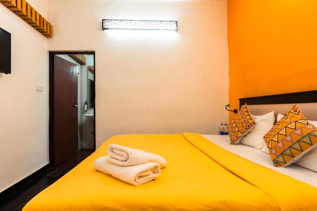 Postel nebo postele na pokoji v ubytování Joey's Hostel Agra - 200m from Taj Mahal