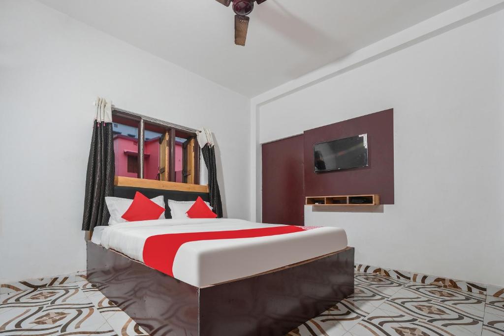 Postel nebo postele na pokoji v ubytování Hotel O ARES RESIDENCY