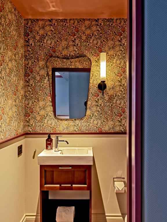Koupelna v ubytování Hotel Mürren Palace