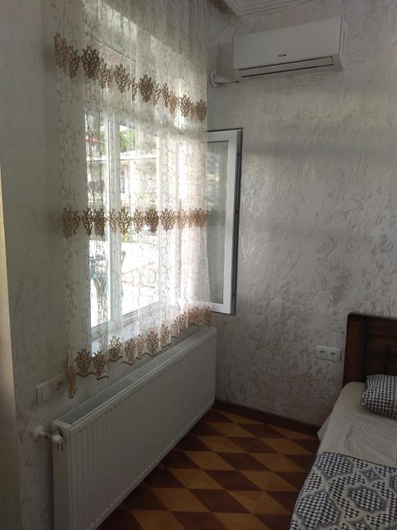 Postel nebo postele na pokoji v ubytování White House Avtandil&Nino