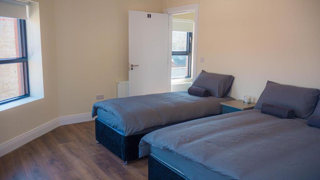 Postel nebo postele na pokoji v ubytování En-suite Triple Room near Croke Park - 1