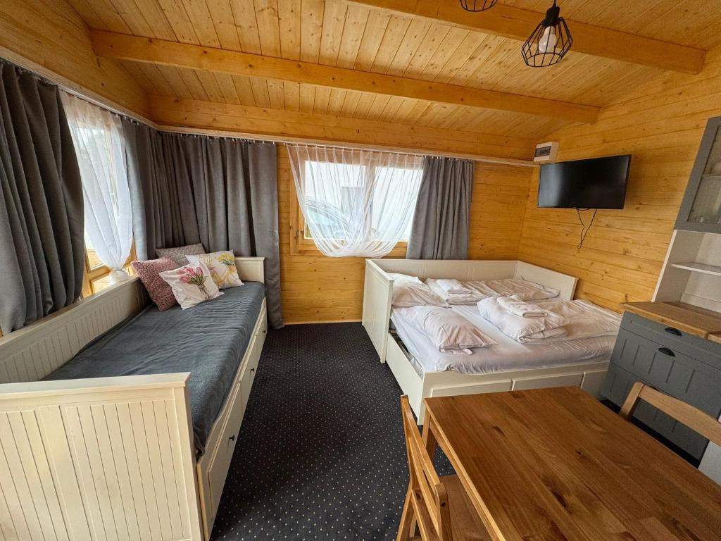 Postel nebo postele na pokoji v ubytování Noclegi AirportPark