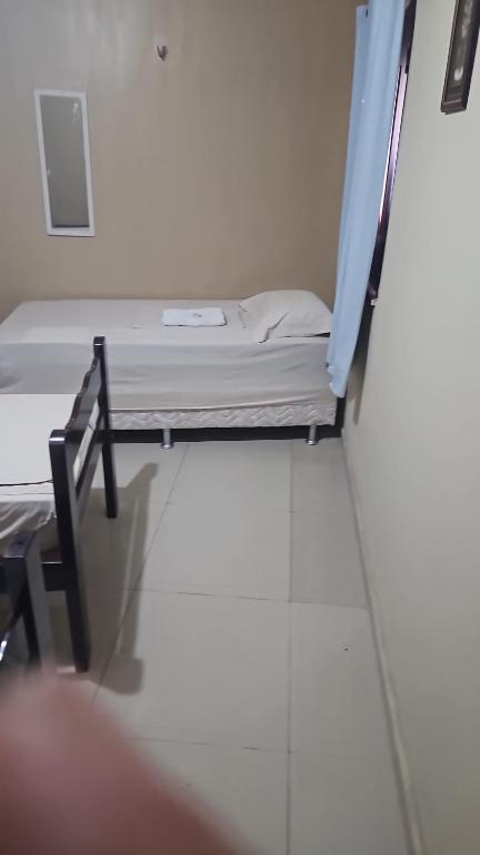 Postel nebo postele na pokoji v ubytování Good Hostel & Pousada