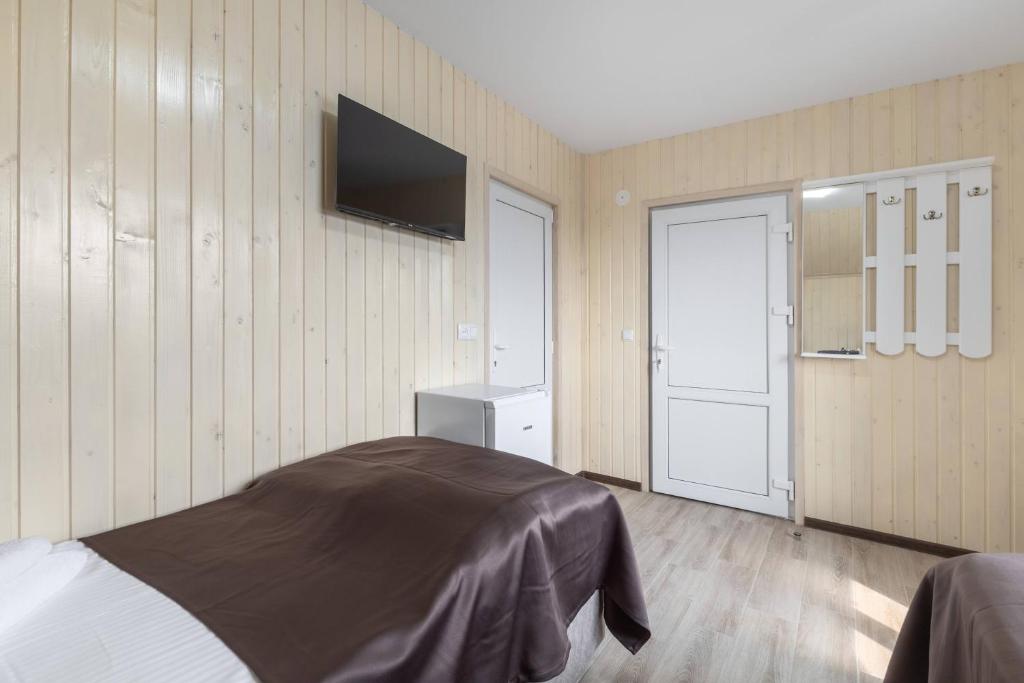 Postel nebo postele na pokoji v ubytování VASOK Hotel NEW 2025
