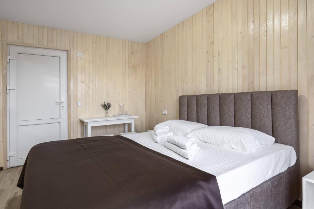 Postel nebo postele na pokoji v ubytování VASOK Hotel NEW 2025