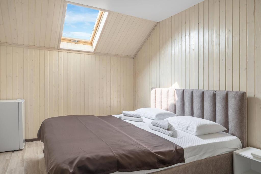 Postel nebo postele na pokoji v ubytování VASOK Hotel NEW 2025