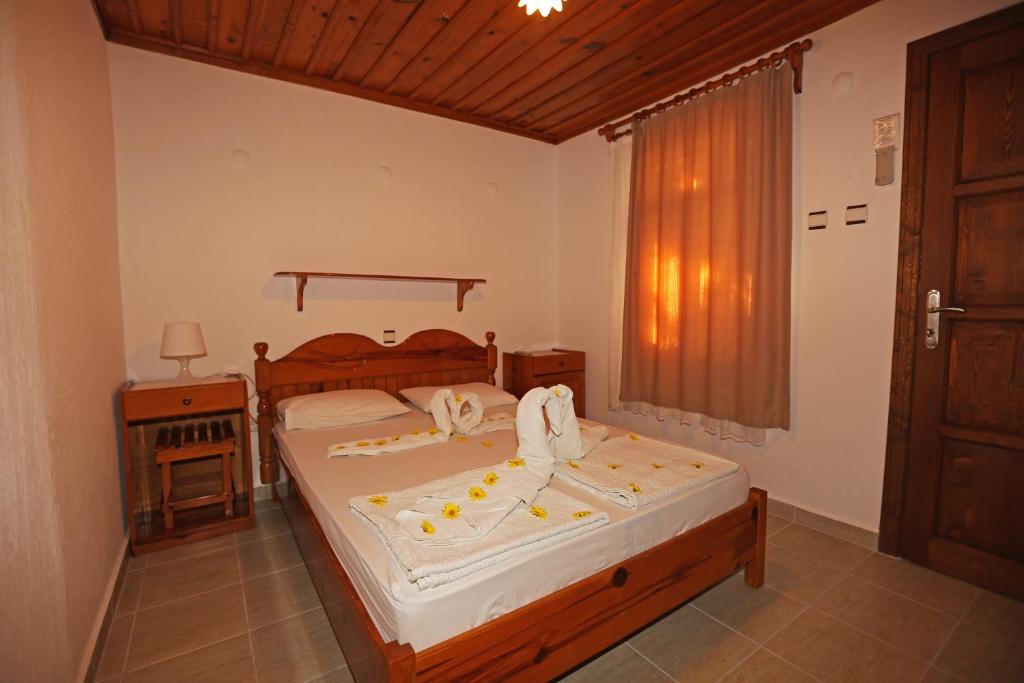 Postel nebo postele na pokoji v ubytování Midas Pension