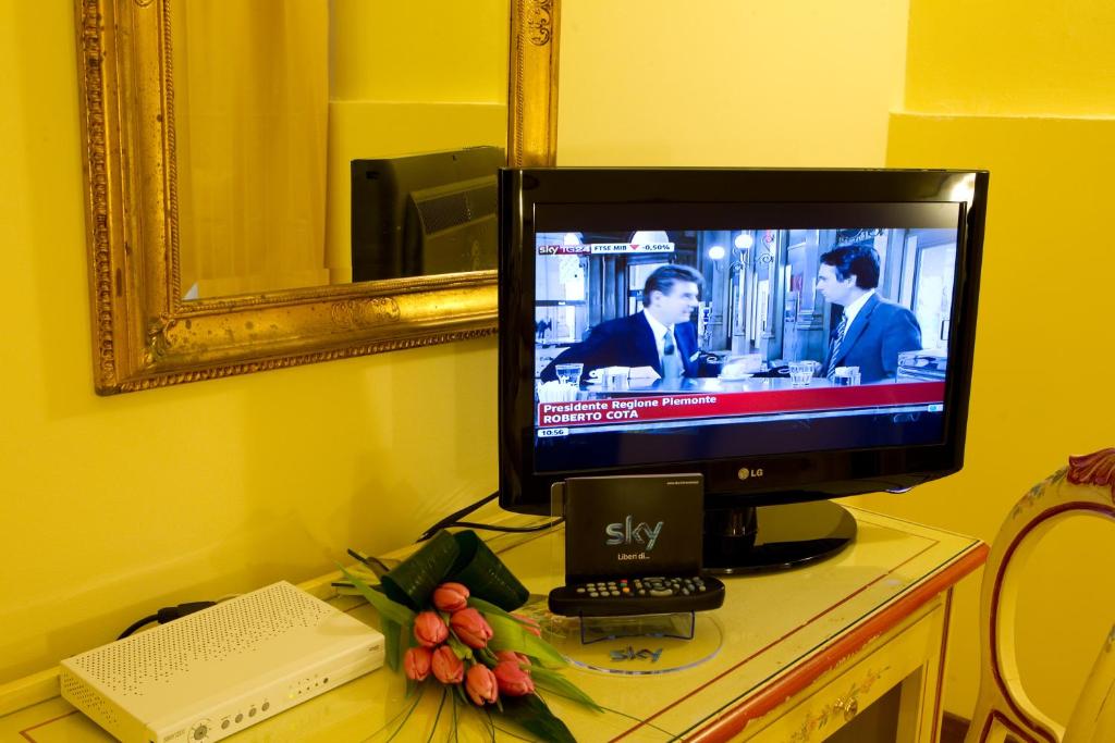TV a/nebo společenská místnost v ubytování Locanda Poste Vecie