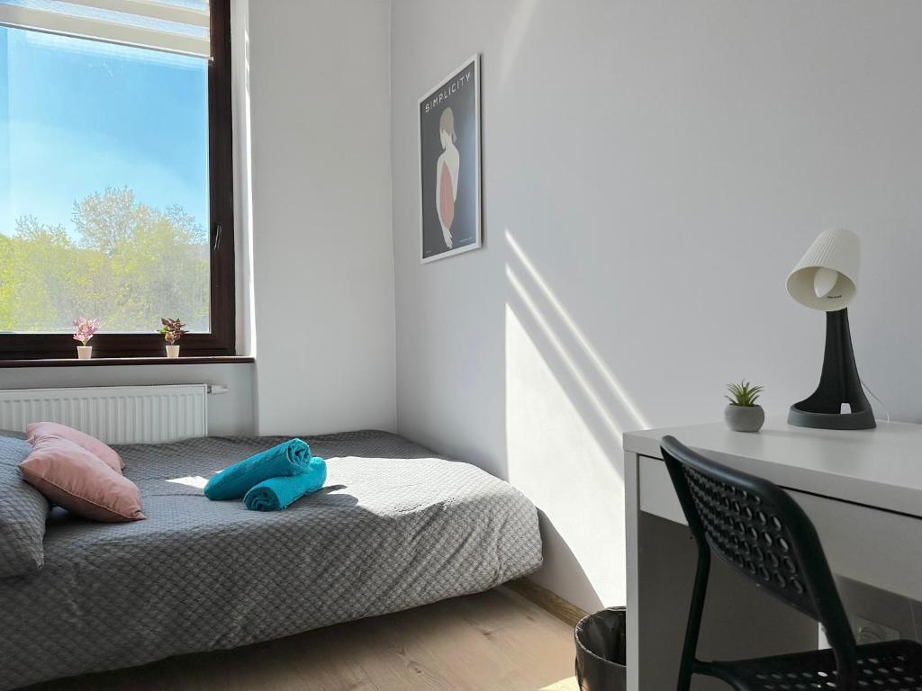 Ένα ή περισσότερα κρεβάτια σε δωμάτιο στο Gamma Room 10 min to Old Town Gdansk