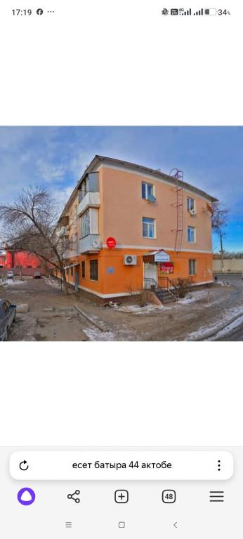 a screenshot of a website with a building at Квартира in Aktobe