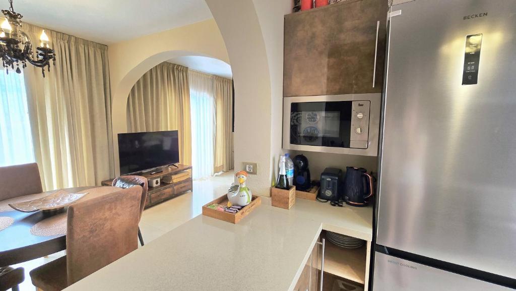 A kitchen or kitchenette at Sunny duplex with sea view of the scenic gorge