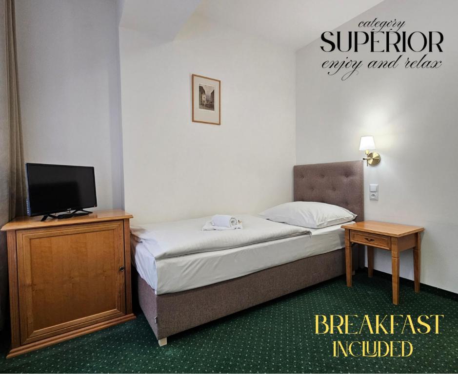 Postel nebo postele na pokoji v ubytování Hotel Claris