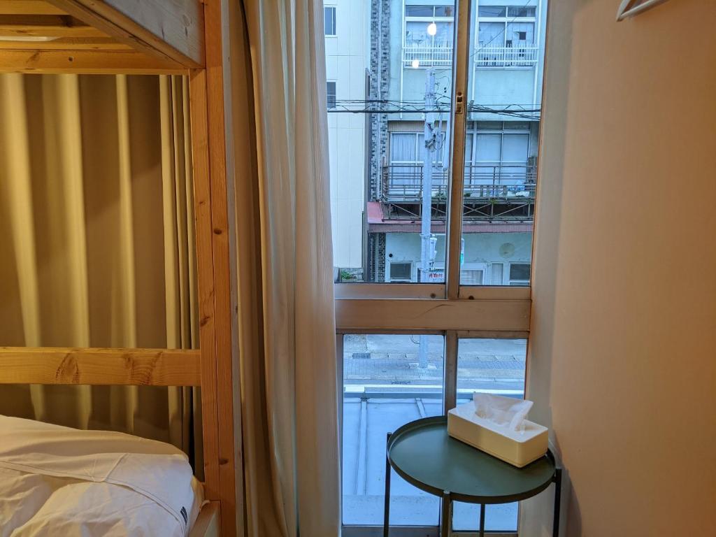 Letto o letti in una camera di Tomarotto Hostel