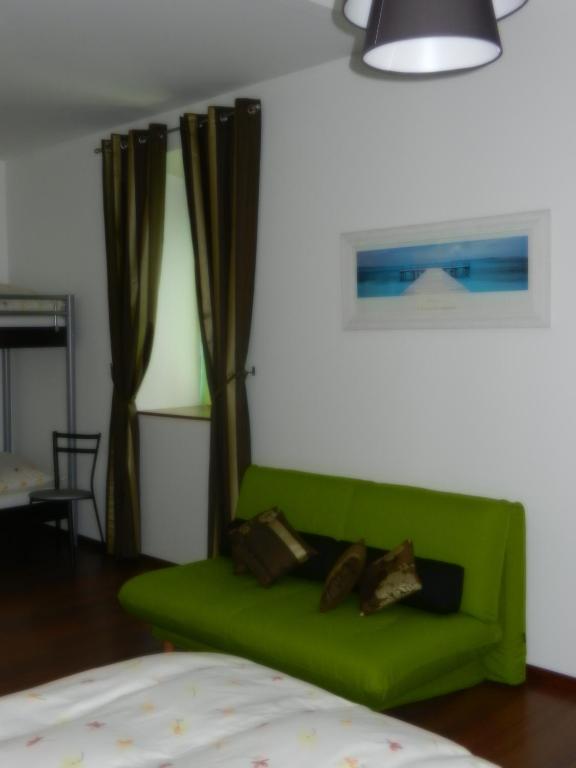 Postel nebo postele na pokoji v ubytování Hôtel Terminus