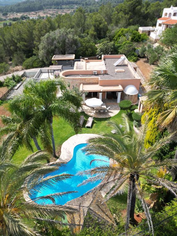 an aerial view of a resort with a swimming pool at Villa Beni - Santa Eulalia in Santa Eularia des Riu