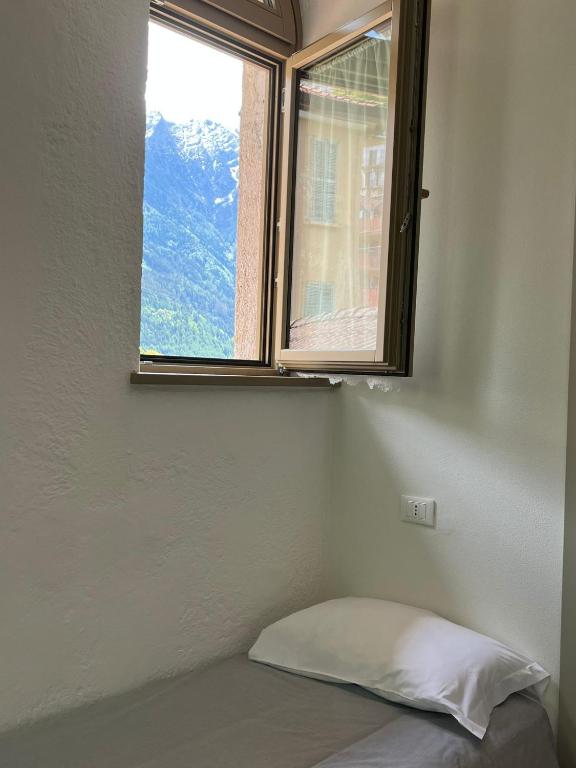 Postel nebo postele na pokoji v ubytování foresteria ca' mon