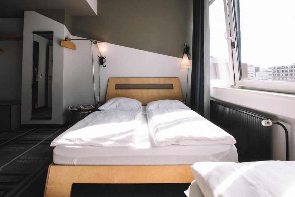 Letto o letti in una camera di Superbude Hamburg St Georg