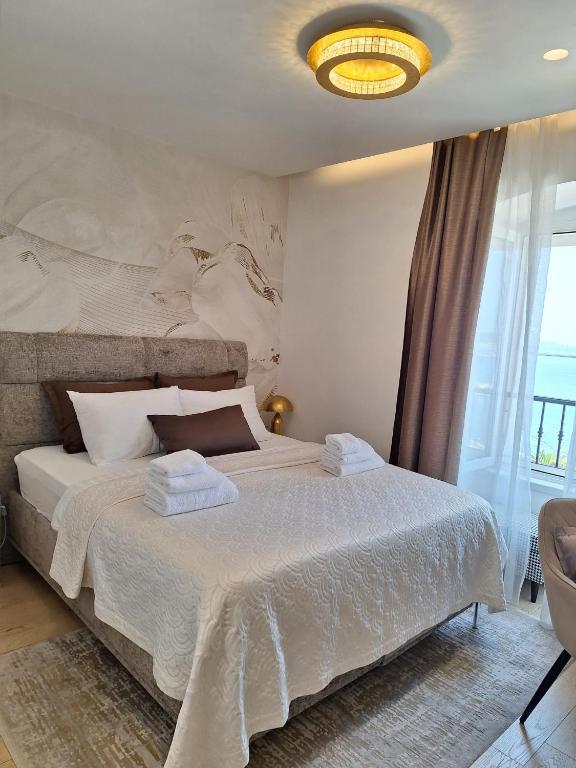 Postel nebo postele na pokoji v ubytování B&B Skynight Split
