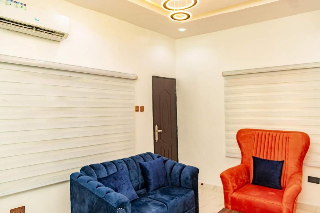 Posezení v ubytování Crowned Crest Apartments