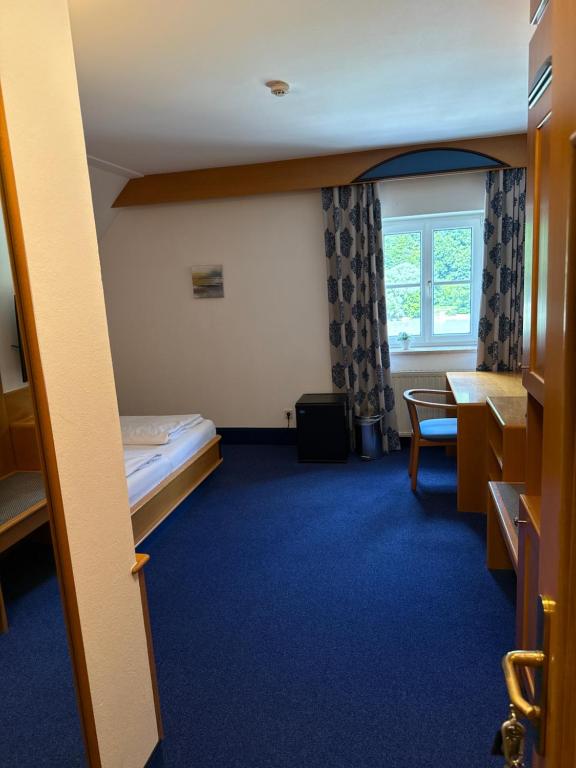 Postel nebo postele na pokoji v ubytování Hotel Goldenes Schiff