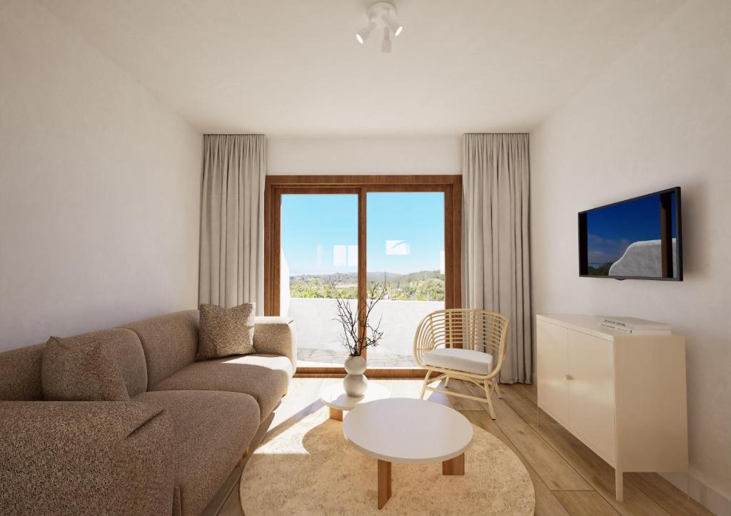 TV a/nebo společenská místnost v ubytování Mas Boronat Resort