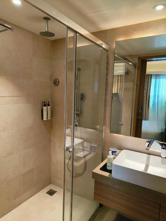 Koupelna v ubytování Royal Hometel Suites