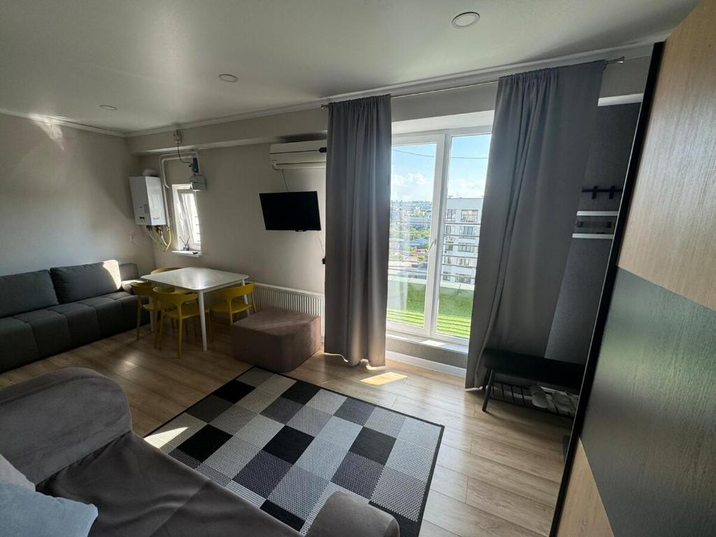 Televizorius ir (arba) pramogų centras apgyvendinimo įstaigoje Skye apartment
