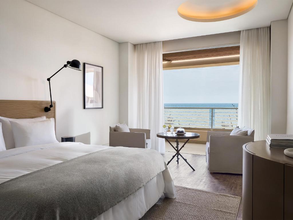 Кровать или кровати в номере Grecotel Astir Palace