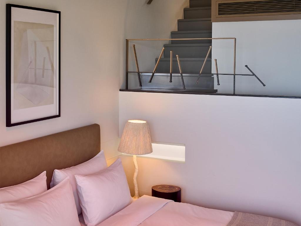 Кровать или кровати в номере Grecotel Astir Palace