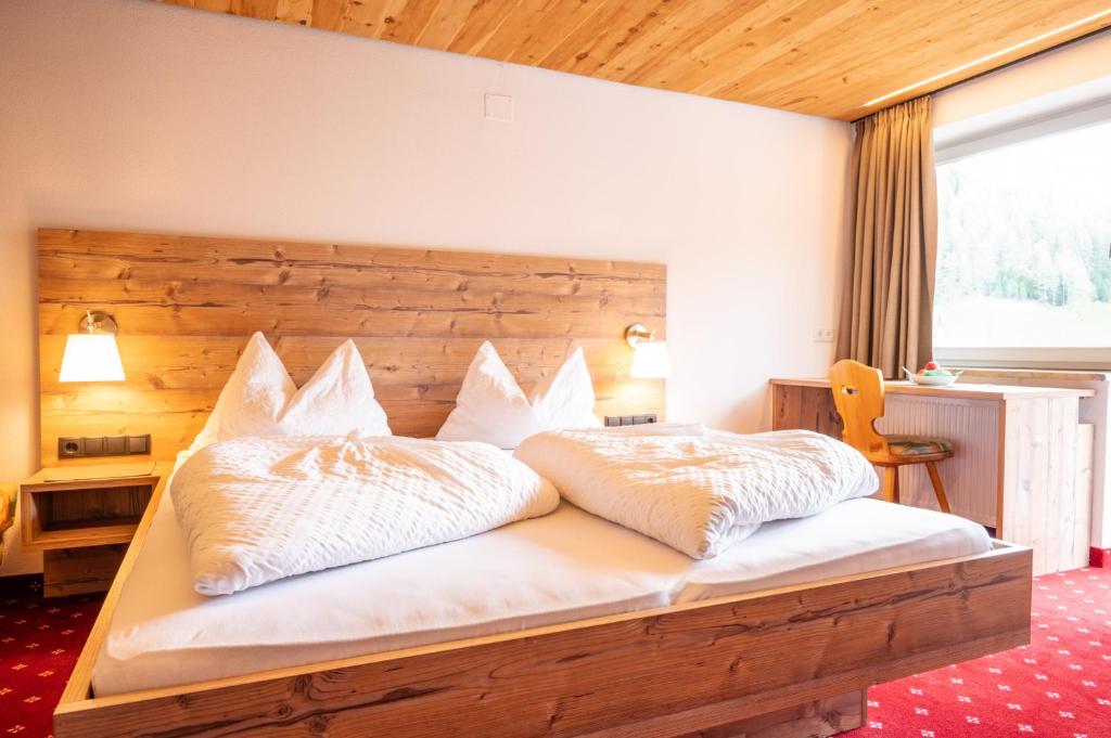 Postel nebo postele na pokoji v ubytování Pichlerhof