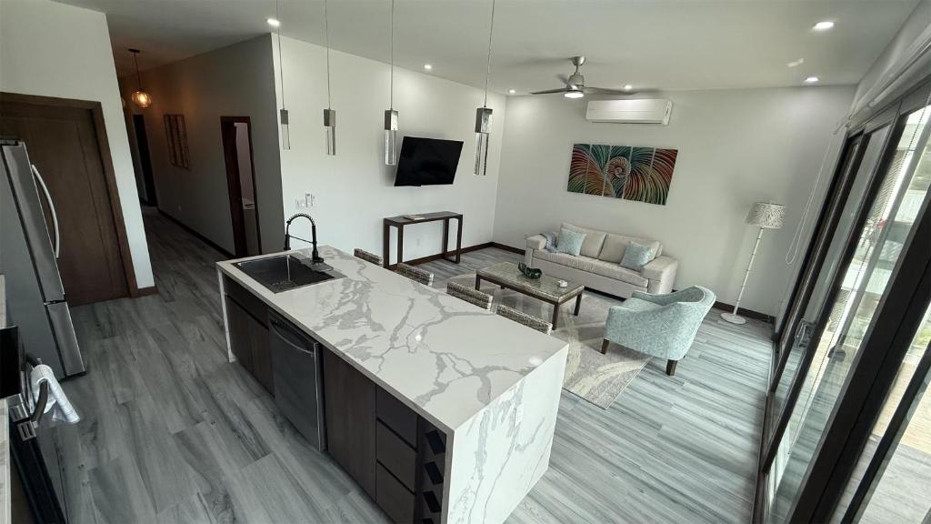 TV a/nebo společenská místnost v ubytování Acqua di Mare Resort