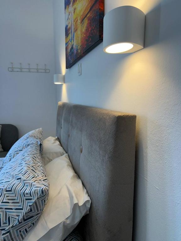 Postel nebo postele na pokoji v ubytování Yanna's Apartments