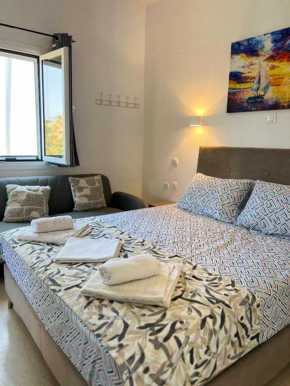 Postel nebo postele na pokoji v ubytování Yanna's Apartments