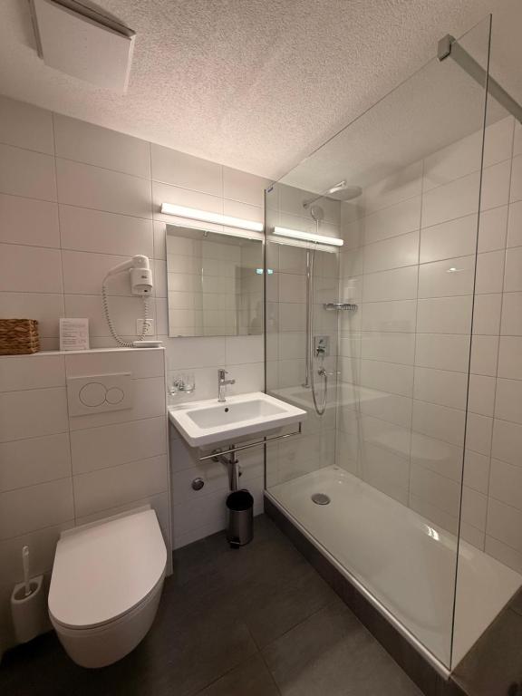 Koupelna v ubytování Hotel Corona