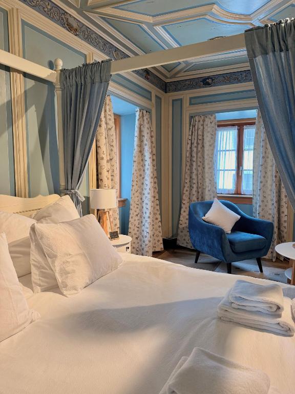 Postel nebo postele na pokoji v ubytování Hotel Corona