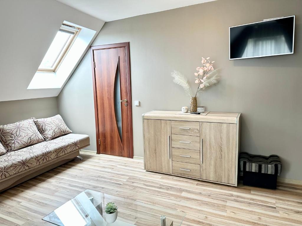 TV a/nebo společenská místnost v ubytování Villa Gāles Hotel