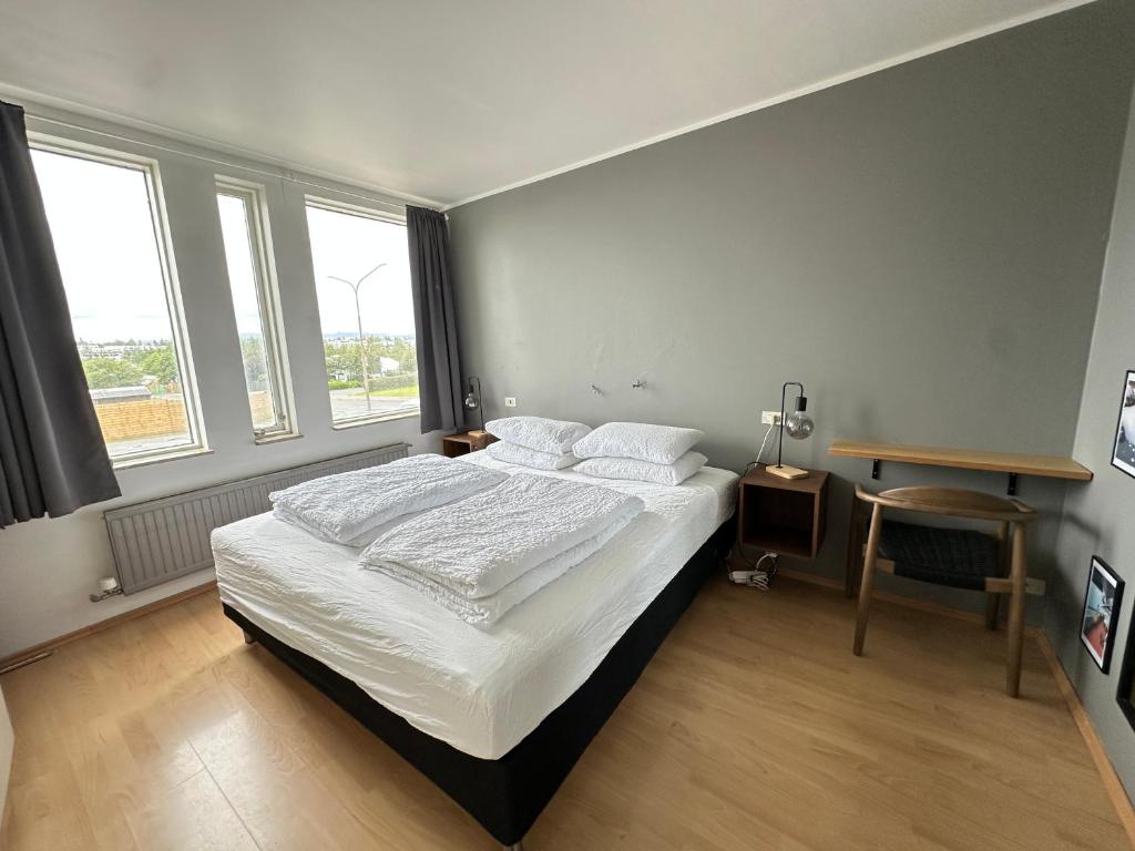 Voodi või voodid majutusasutuse Cosy and family friendly apartment in Kópavogur - Birta Rentals toas
