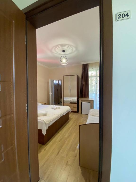Postel nebo postele na pokoji v ubytování Guest House Deme