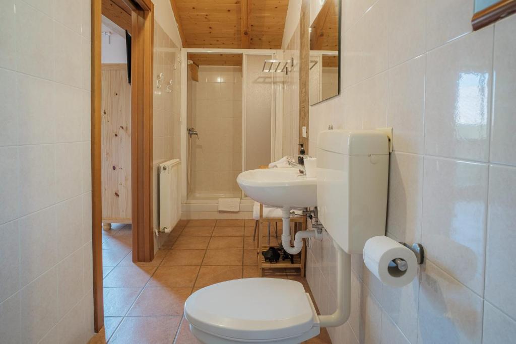 Koupelna v ubytování APARTHOTEL STREMBO