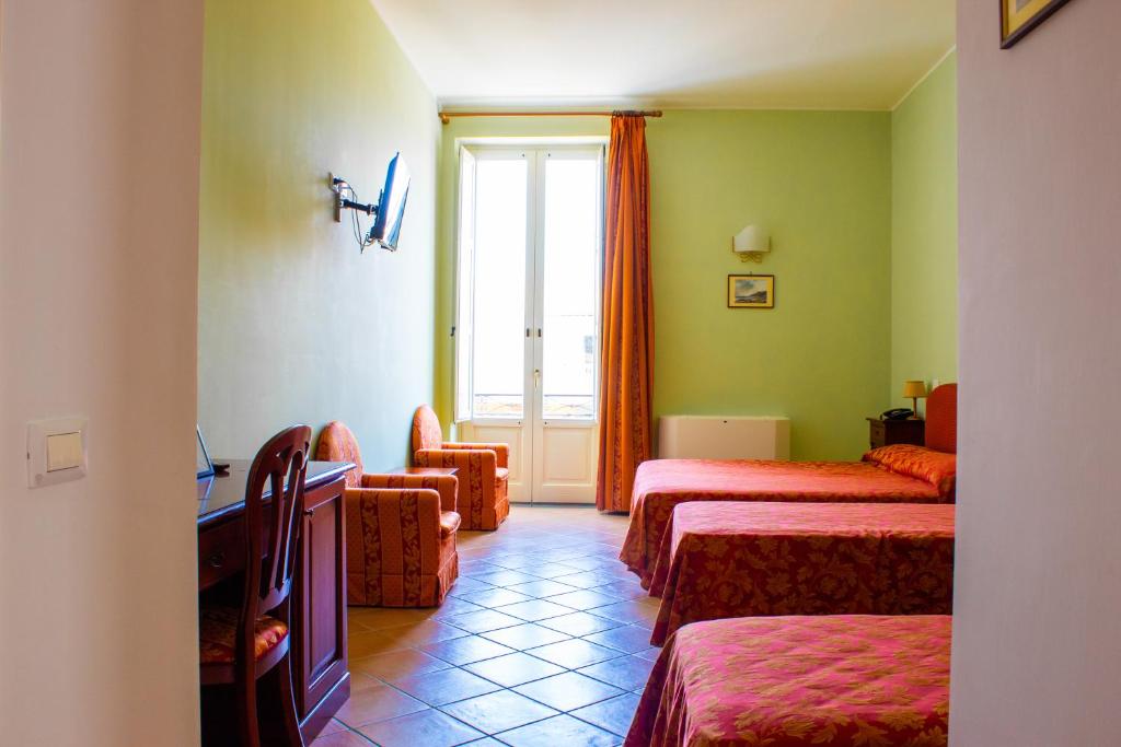 Palazzo Albini - Habitación Cuádruple Clásica