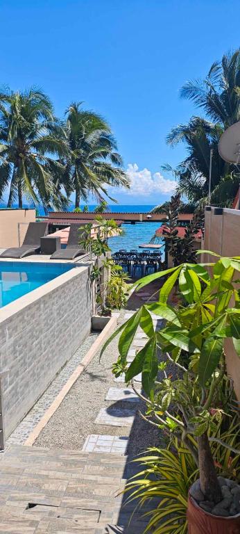 Piscina di Exclusive Beachfront House with Pool Batangas 16pax o nelle vicinanze