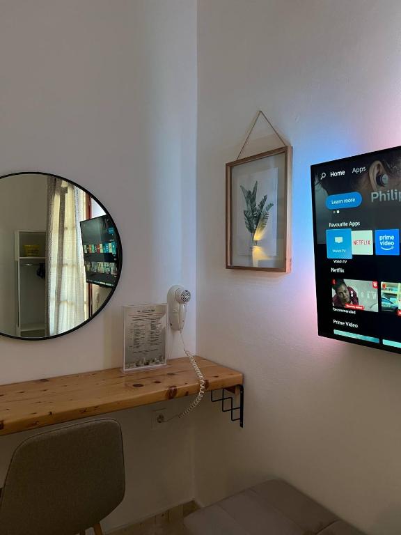 TV a/nebo společenská místnost v ubytování Yanna's Apartments
