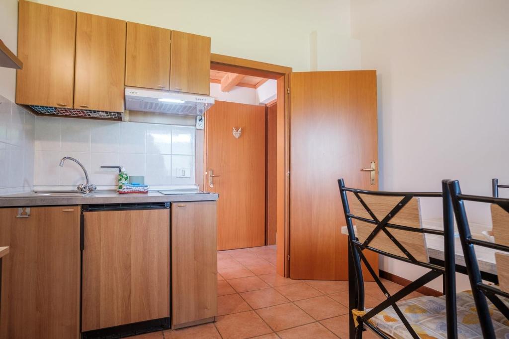 Kuchyň nebo kuchyňský kout v ubytování APARTHOTEL STREMBO