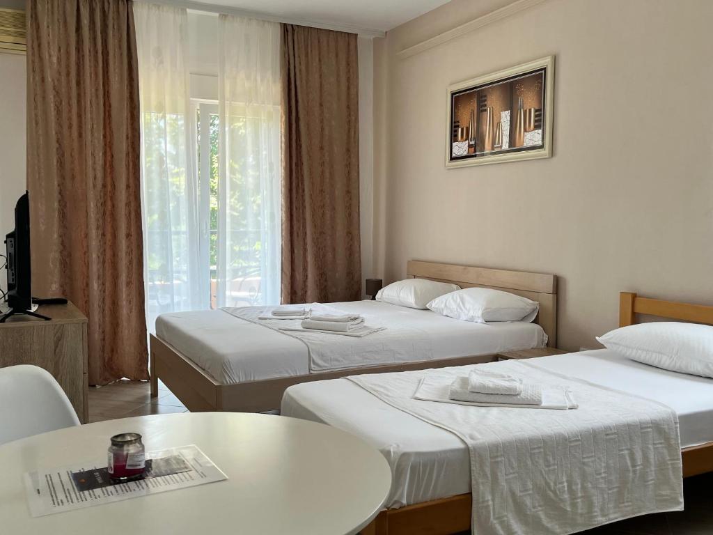 Postel nebo postele na pokoji v ubytování Guesthouse P&A