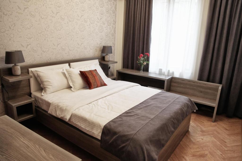 Postel nebo postele na pokoji v ubytování Hotel Four Brothers