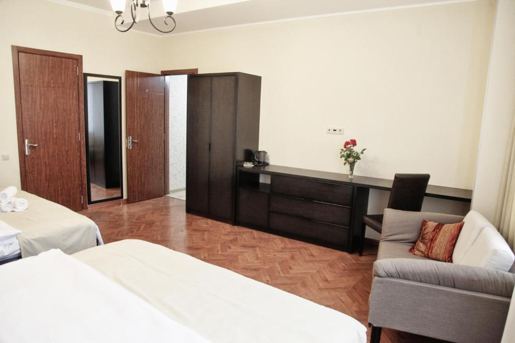 Postel nebo postele na pokoji v ubytování Hotel Four Brothers