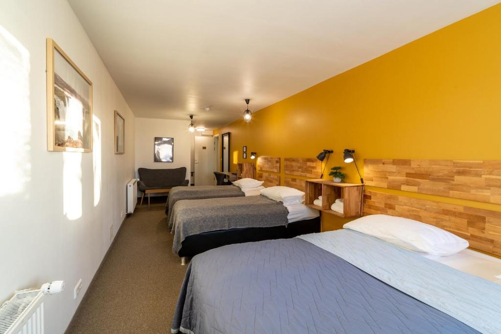 Postel nebo postele na pokoji v ubytování Adventure Hotel Hof