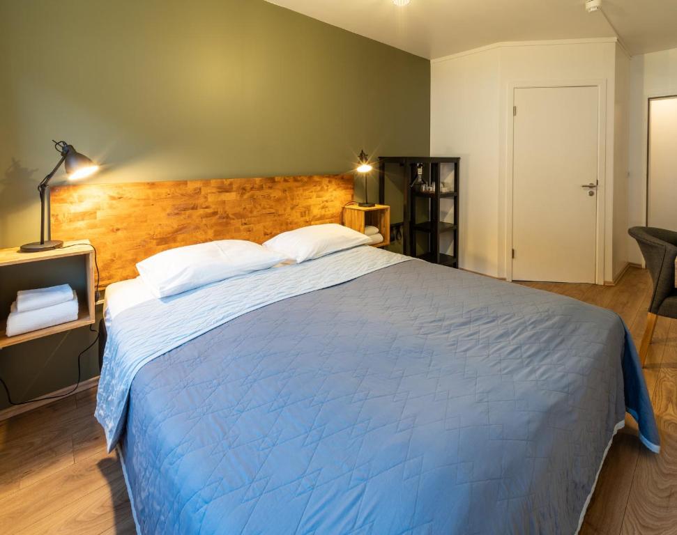 Postel nebo postele na pokoji v ubytování Adventure Hotel Hof
